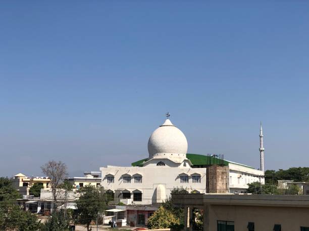 istock Tombs and minaret of a mosque 1304680932