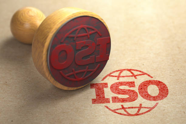 Concepto de certificación ISO 9001. Sello de goma con texto ISO 9001 sobre fondo de papel artesanal. Control de calidad. - Imágenes de stock, fotos e imágenes ISO 9001, libres de regalías y sin costo.