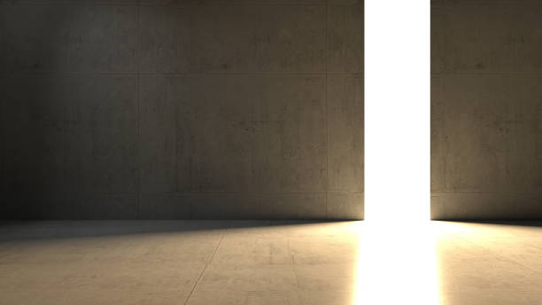istock Empty dark abstract industrial cement hangar wall like studio room interior with bright light hole 1304683257