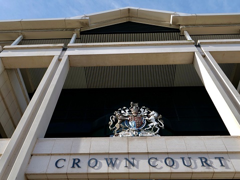 London, UK- February 23, 2021: The office building of Crown court in kingston borough.The Crown Court of England and Wales is one of the constituent parts of the Senior Courts.