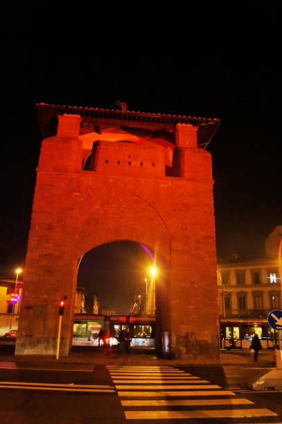 istock Porta al Prato illuminated at night in Florence 1304686371