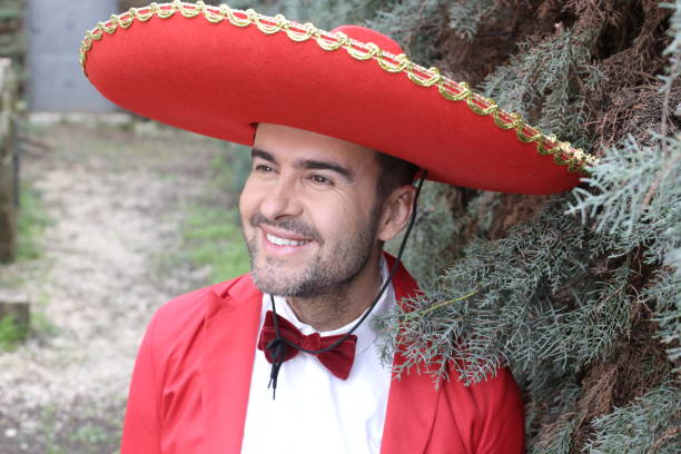 istock Traditional mexican man with elegant red outfit 1304689540