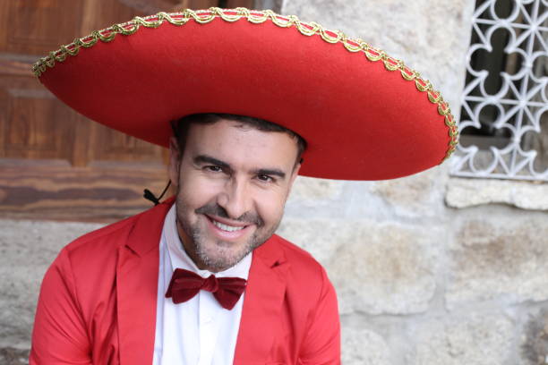 istock Traditional mexican man with elegant red outfit 1304689641