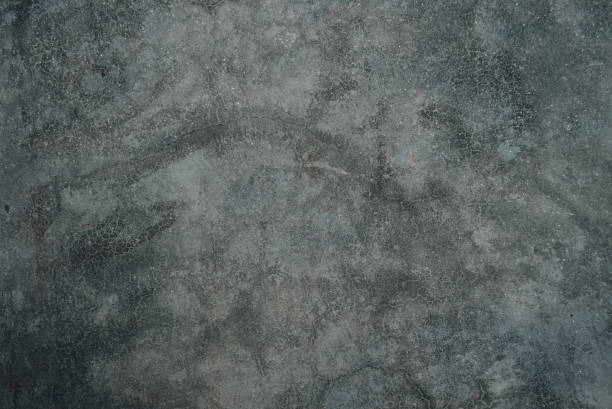 istock Raw and crack cement wall or concrete wall abstract  background 1304689703