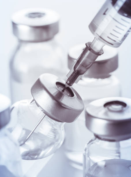 istock syringe and medicine bottle for injection 1304689883