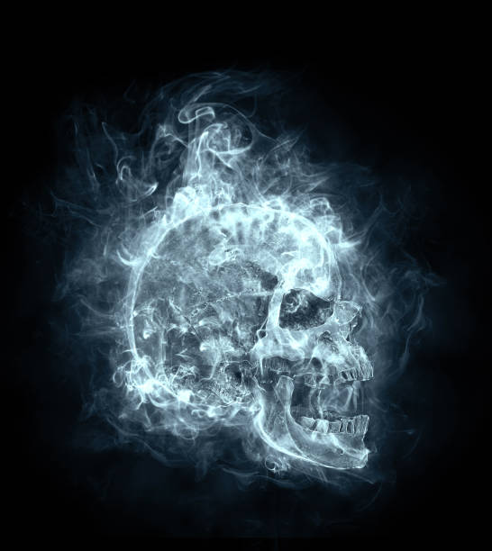 istock skull in the smoke, flying on a black background 1304695617