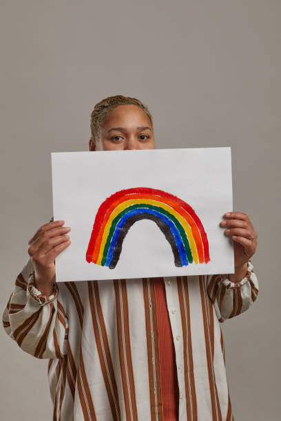 istock Contemporary Mixed Race Woman with Rainbow 1304696830