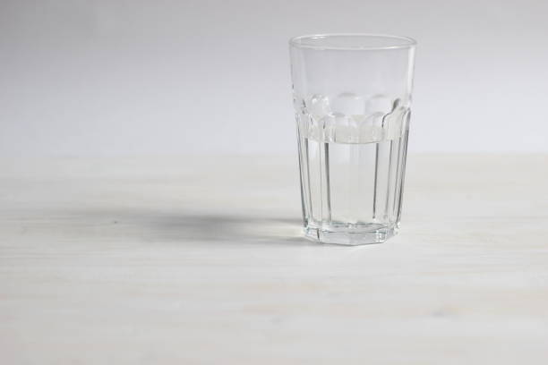istock glass of pure water on white background 1304697648