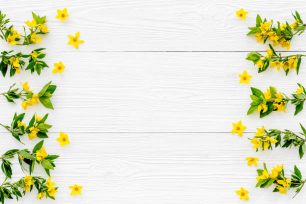 istock Wild spring flowers top view. Floral frame with space for text 1304698618