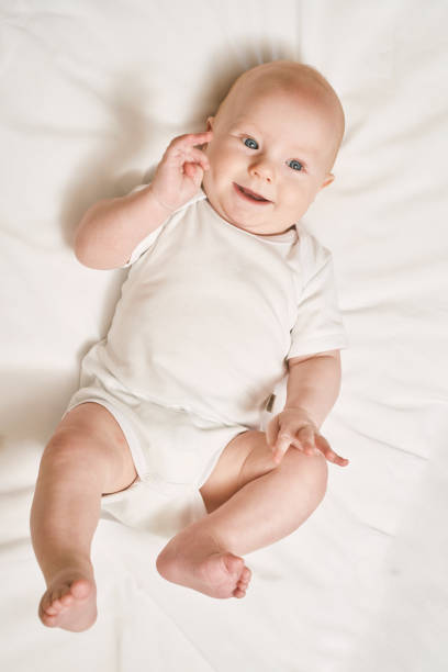 istock Cute small boy lying at bed. Childhood concept 1304700398