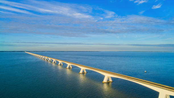 istock Aerial image of beautiful bridge over blue sea 1304702273