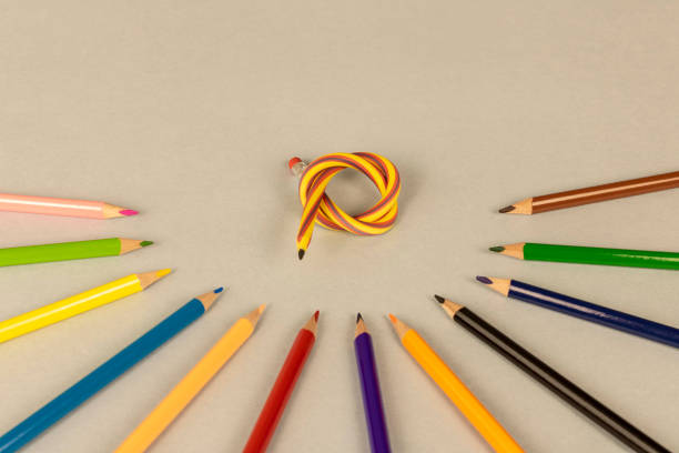 istock Multicolor pencils and flexible pencil on a light background. Close up. Selective focus. 1304702676