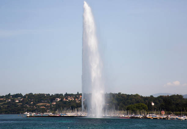 istock Fountain against blue sky, Geneva, Switzerland 1304705539