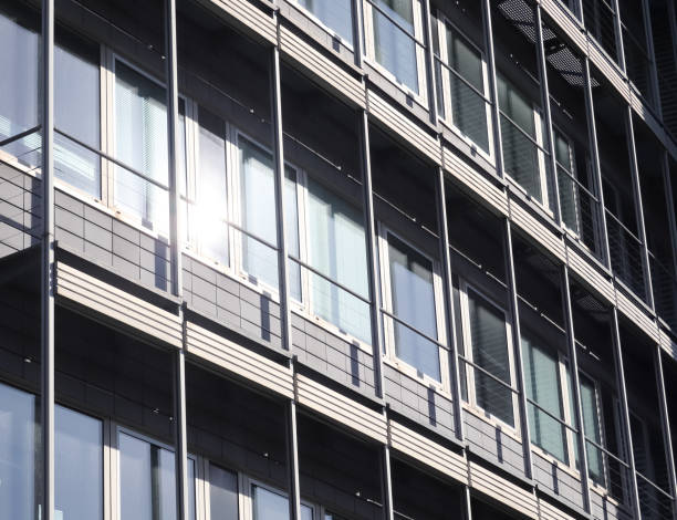 Modern office building facades with glass and reflecting sunlight in the windows