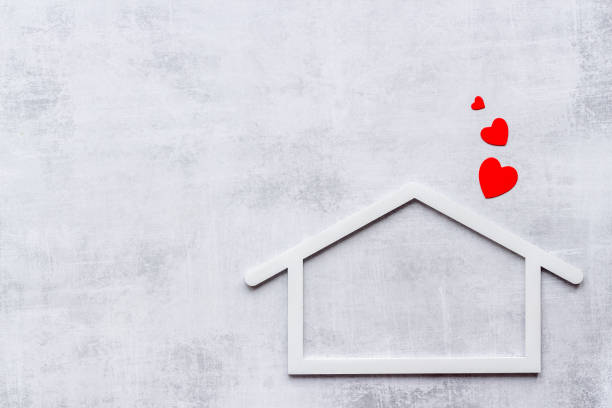 istock House shape with heart. Love family concept 1304708472