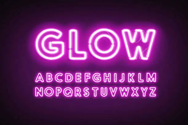 Photo of Purple neon capital alphabet letters, glow ultraviolet font