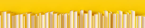 A row of yellow books on a yellow background. 3D rendering illustration. A row of yellow books on a yellow background, 3D rendering illustration. rows of books stock pictures, royalty-free photos & images
