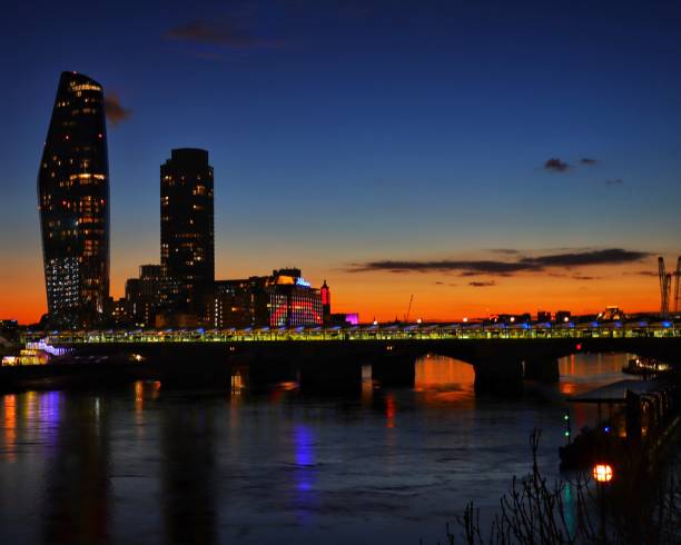 istock Sunset over the River Thames in London 1304711578