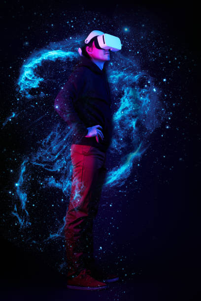 istock Man with virtual reality headset. Elements of this image furnished by NASA. 1304717113