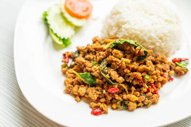 istock Pad Kra Prow Moo Sub or stir fried minced pork with holy basil, chilli, garlic and sauc 1304718157