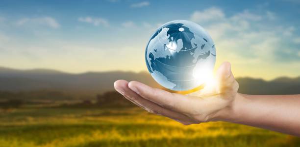 istock Globe in hand, Earth energy saving concept, image furnished by NASA 1304721345