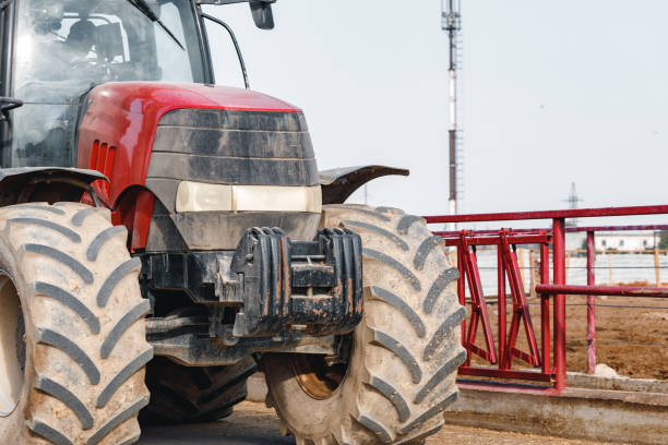 istock Old agriculture tractor working on a farm 1304722594