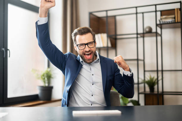 istock Successful young bearded businessman with laptop 1304724698