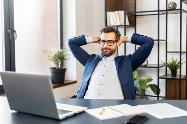 istock Successful bearded young businessman at workplace 1304724791