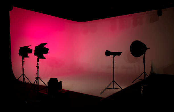 istock Empty photo studio with photography lighting equipments 1304724858
