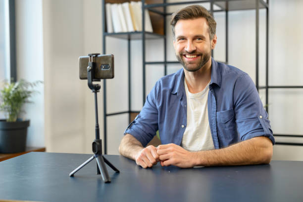 istock Young bearded male blogger looking at the camera 1304724904
