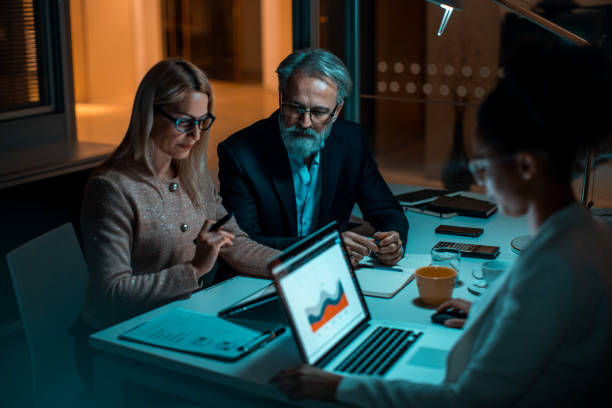 istock Business people working late in the office 1304725572