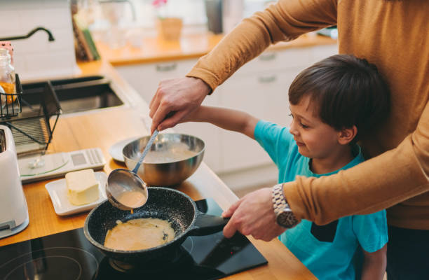 Family cooking at home, COVID-19 lockdown