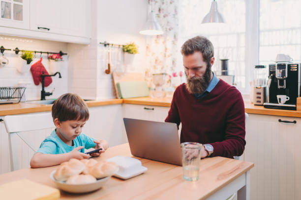 istock Home office and parenting during COVID-19 pandemic 1304727695