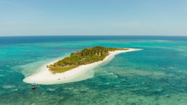 istock Beautiful beach on a tropical island. Balabac, Palawan, Philippines 1304728225