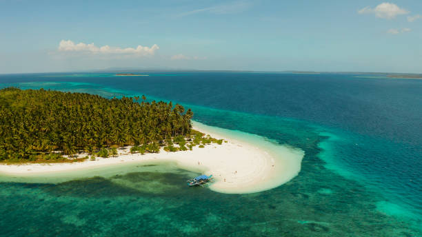 istock Tropical island with sandy beach. Balabac, Palawan, Philippines 1304728830