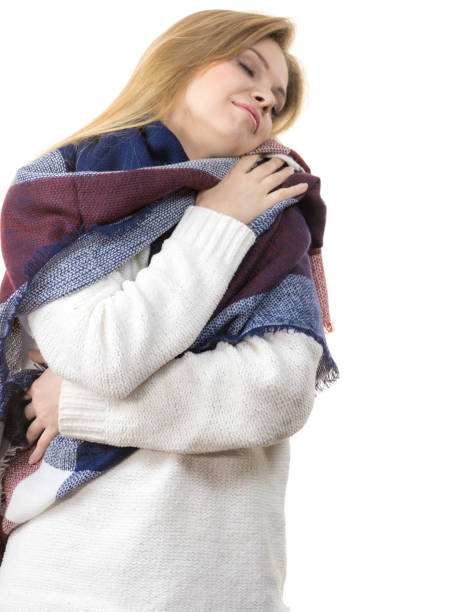 istock Woman wearing warm scarf 1304730055