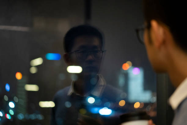 istock Asian man in home quarantine at night 1304730503