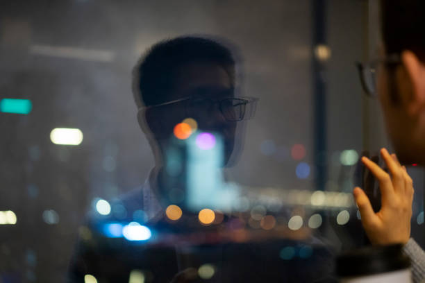 istock Asian man in home quarantine at night 1304730504