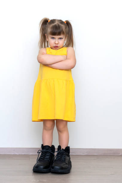 istock little girl in big daddy boots 1304730739