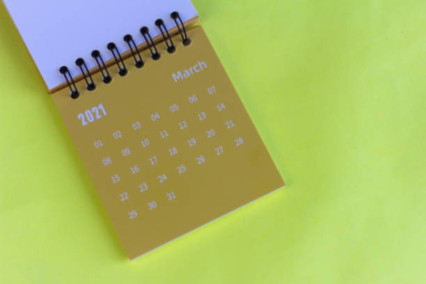 istock Flip calendar for March 2021. Desktop calendar for planning, scheduling, assigning, organizing, managing each date. 1304730827