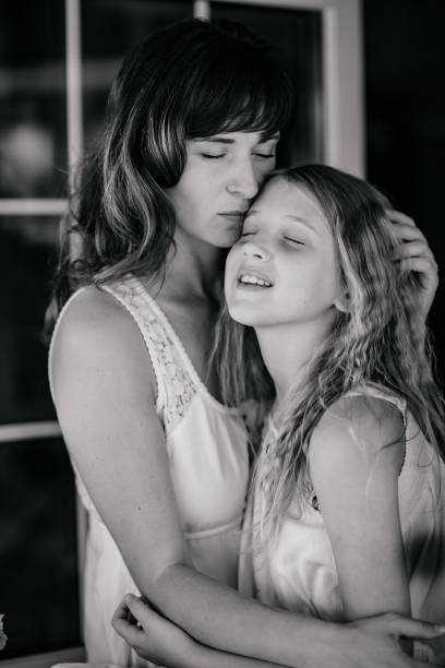 istock Mom hugs her daughter. 1304732059