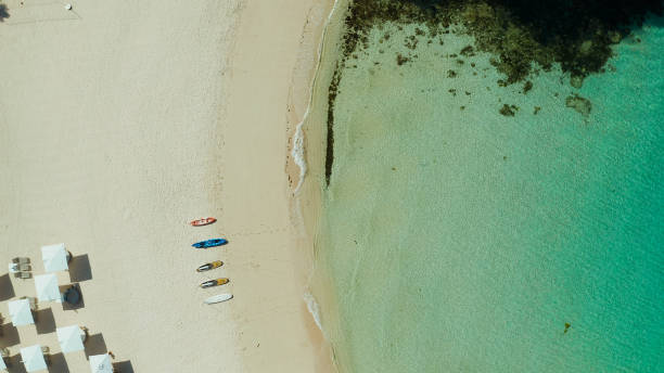 istock Tropical beach and blue lagoon 1304734908