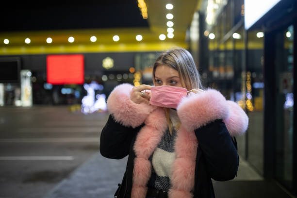 istock Putting protection mask on and going for some shopping 1304740405