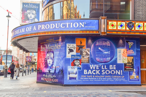London, United Kingdom - February 26 2021: 'We'll Be Back Soon'  message at Sondheim Theatre in West End, closed during the national coronavirus lockdown.