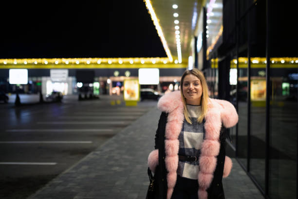 istock Young woman walk in a shopping mall 1304741778