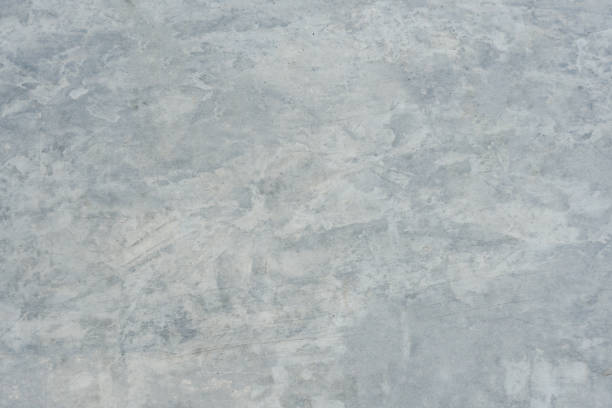 istock Gray concrete texture wall dirty background. old dirty grunge cement wall background. 1304746433
