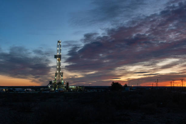 istock An Oil Or Gas Drill Fracking Rig Pad with Beautiful Cloud Filled Sky at Sunrise 1304747376