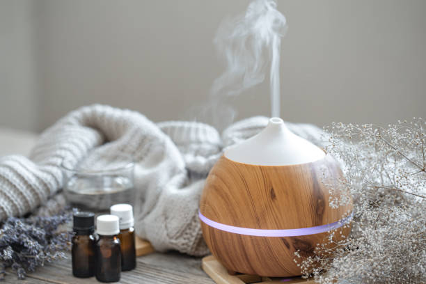 istock Composition with an air humidifier and a set of aromatic oils. 1304747746