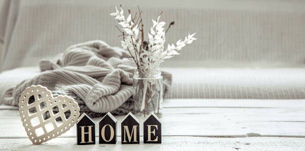 istock Cozy composition in Scandinavian style with decorative word home and decor details. 1304748847