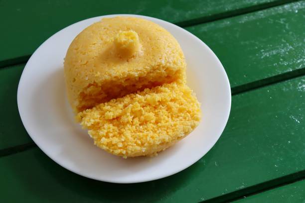istock Brazilian Couscous (Cuscuz Brasileiro) on green background. Breakfast. 1304750270